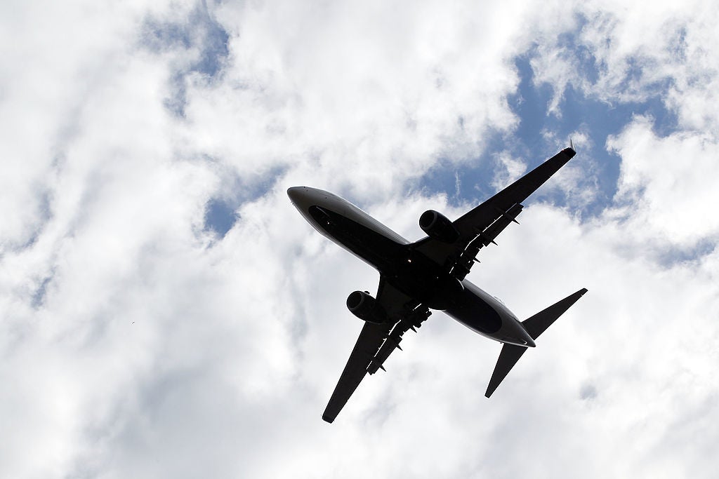 Russian Woman Mistakenly Walks Onto Baggage Conveyor Belt